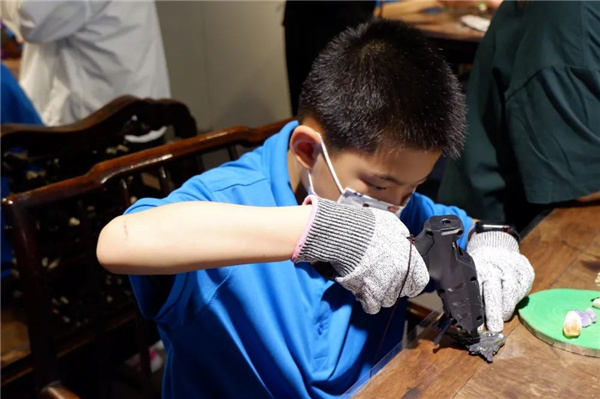 “石·尚北京 童心相約”——“走進(jìn)非遺看北京”非遺文化普及體驗(yàn)活動之“觀賞石的花樣年華”